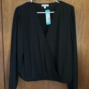 Classy, scalloped detail, black blouse